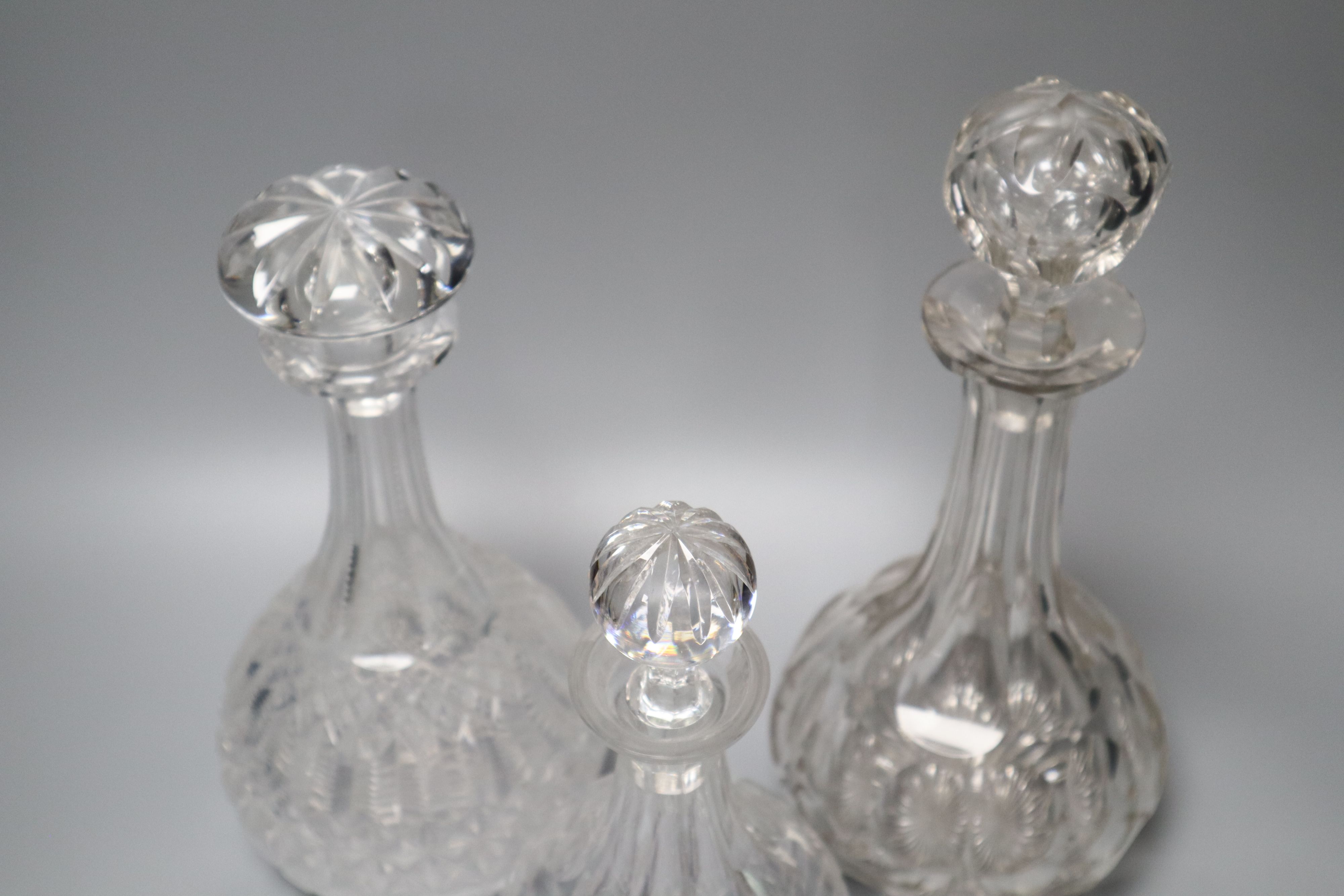 An Edinburgh crystal decanter and stopper and two other decanters and stoppers (3)